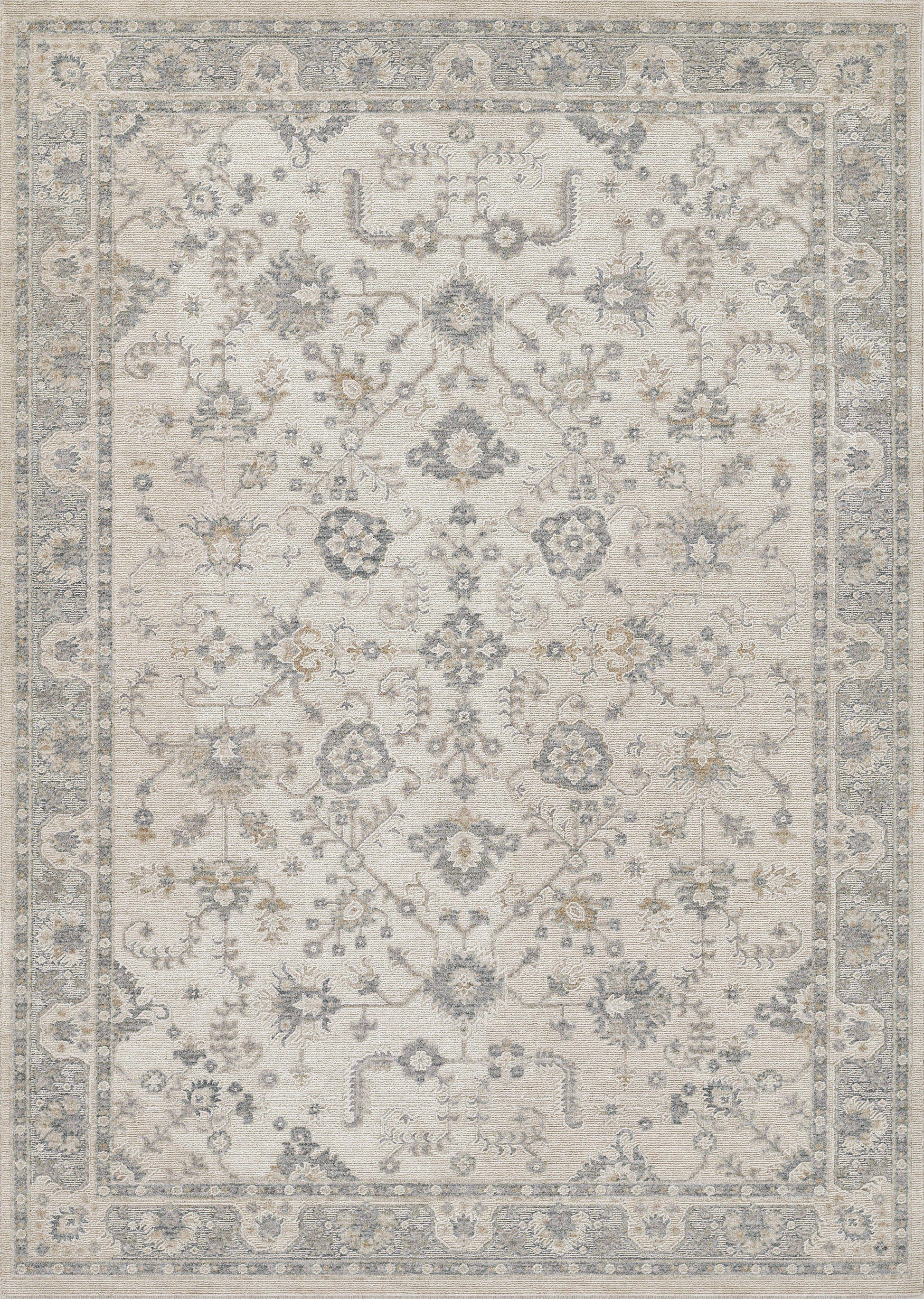 Beige Persian-style area rug with blue-gray floral medallions and an ornate border.