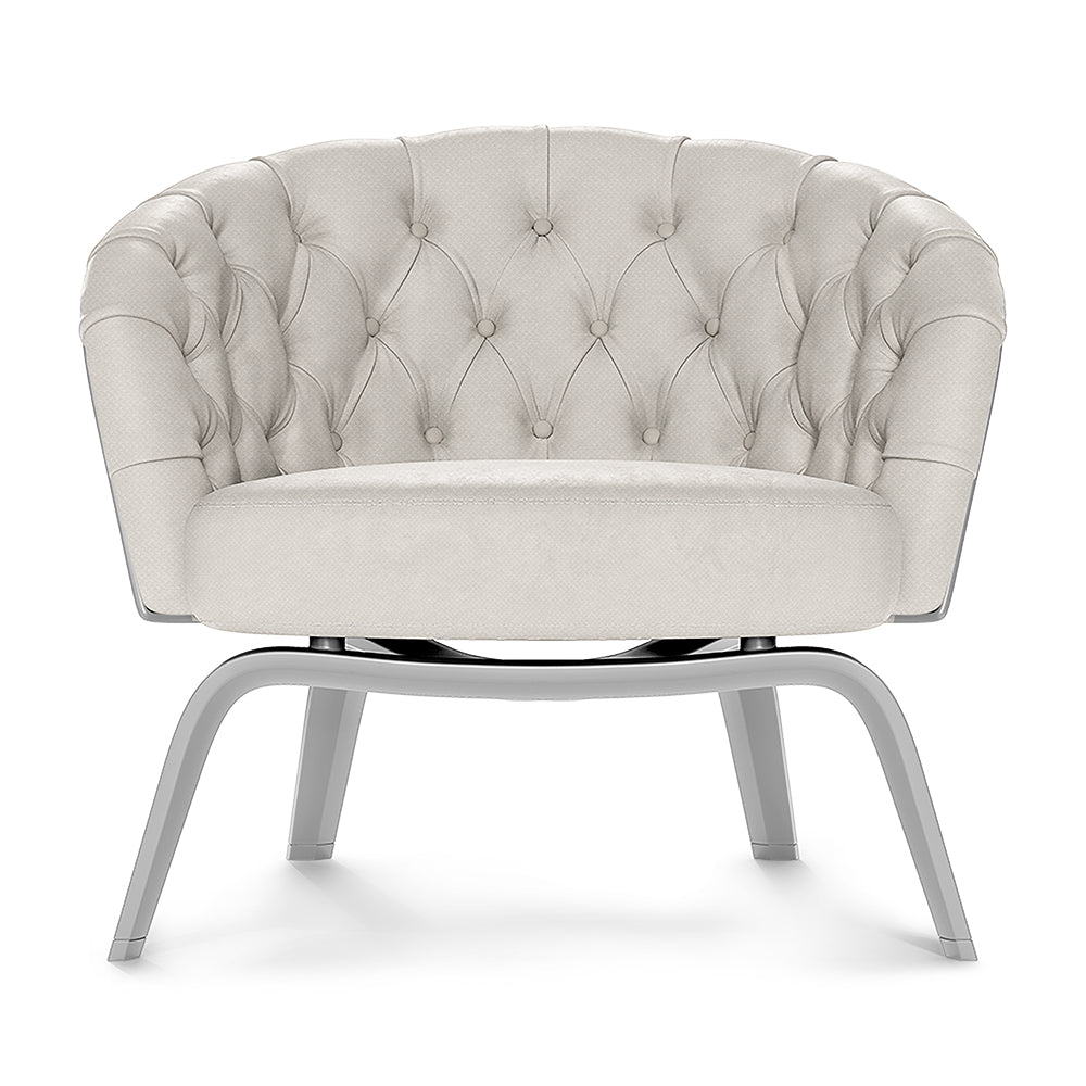 Beige tufted round-back lounge chair with curved arms and chrome circular base on curved metal legs.