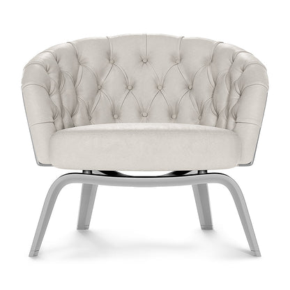 Beige tufted round-back lounge chair with curved arms and chrome circular base on curved metal legs.