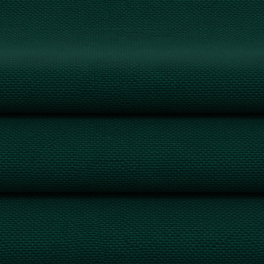 Flat lay of dark green woven fabric with pronounced texture and folded edges.