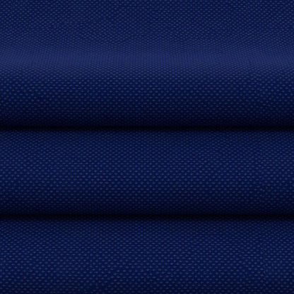 Blue solid fabric, folded flatlay; soft textile for apparel or crafts.