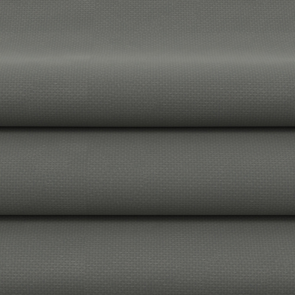 Gray solid upholstery fabric rolls with a tight weave; flatlay display, ideal for sofas, cushions, or drapery.