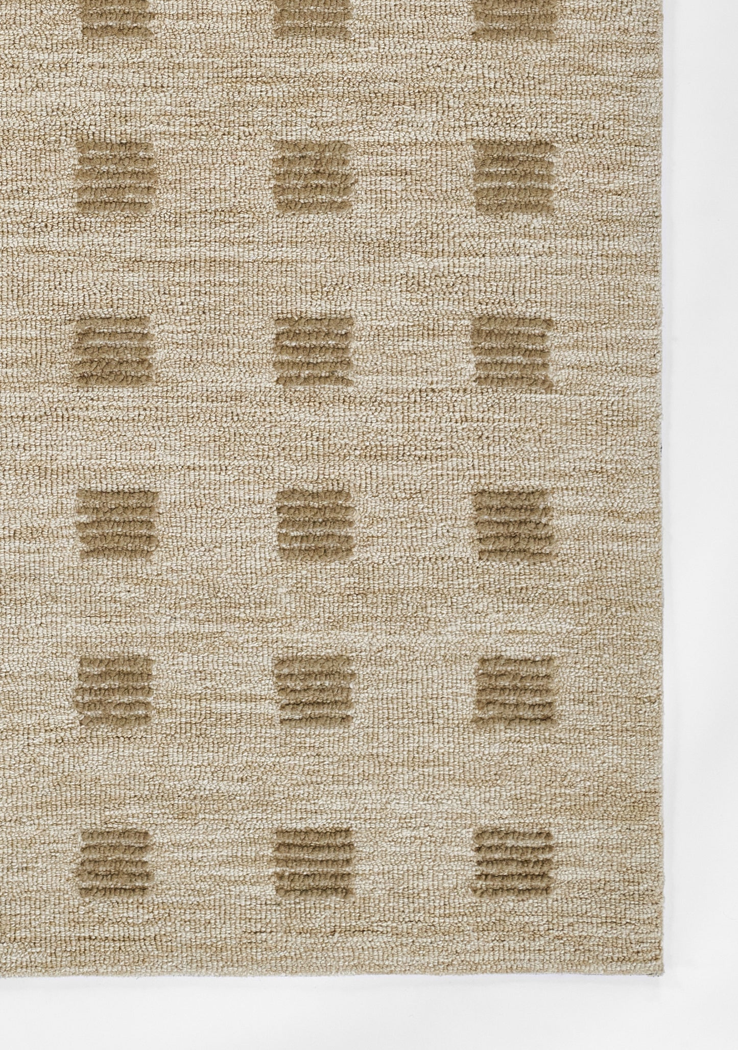Beige rectangular area rug with a repeating grid of textured square blocks for a neutral, modern look.