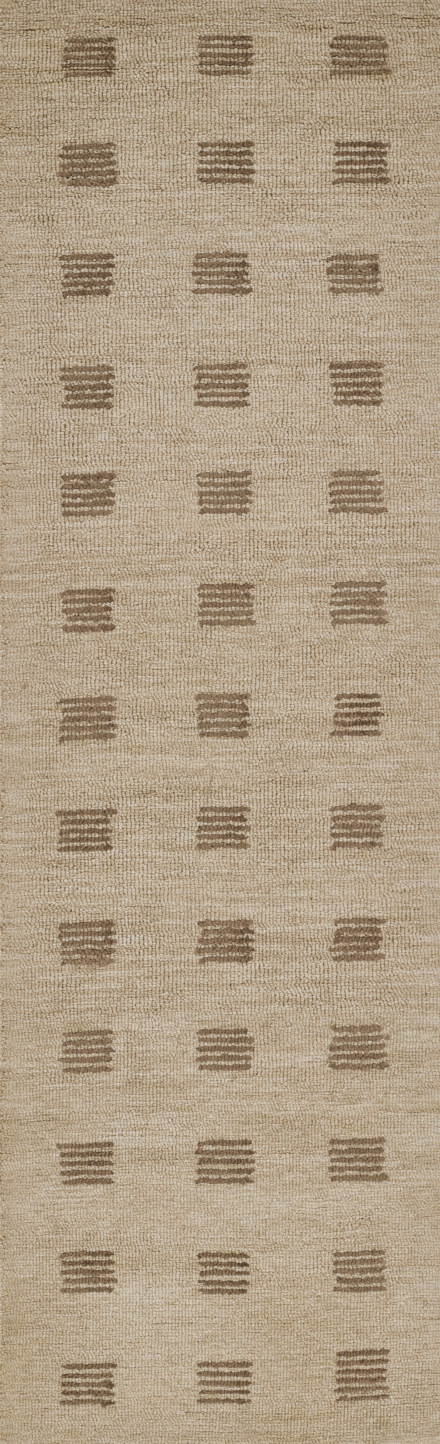 Beige woven rug with evenly spaced dark brown stacked-bar squares in a grid.