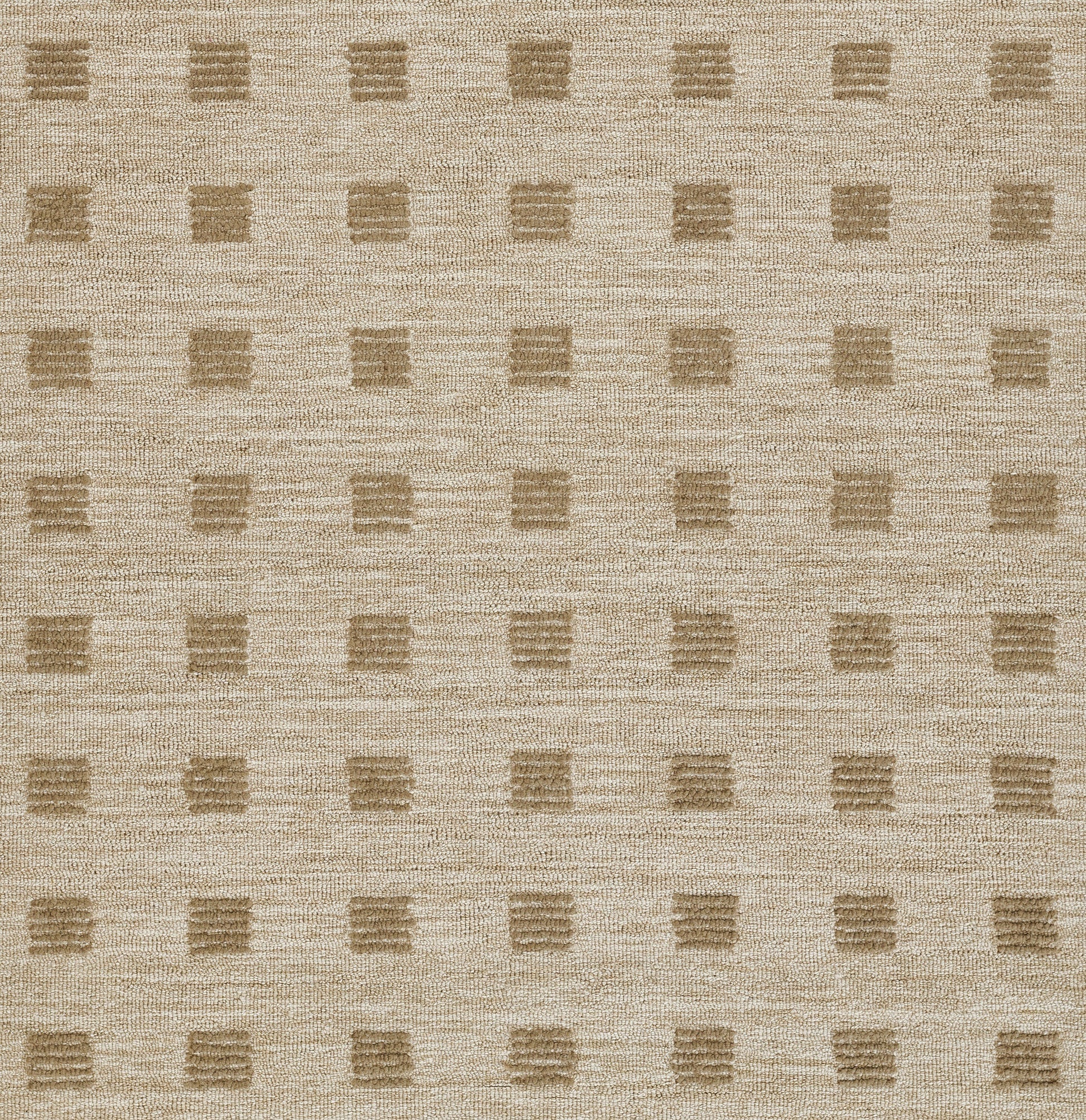 Beige textured area rug with a subtle grid of darker tan square blocks.