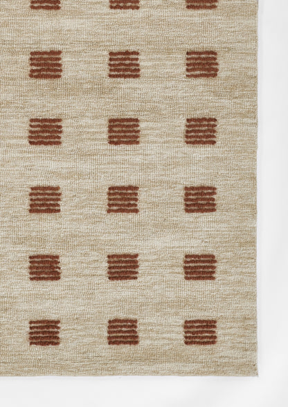 Beige woven runner rug with rust-brown square block motifs in a regular grid; natural fiber texture.