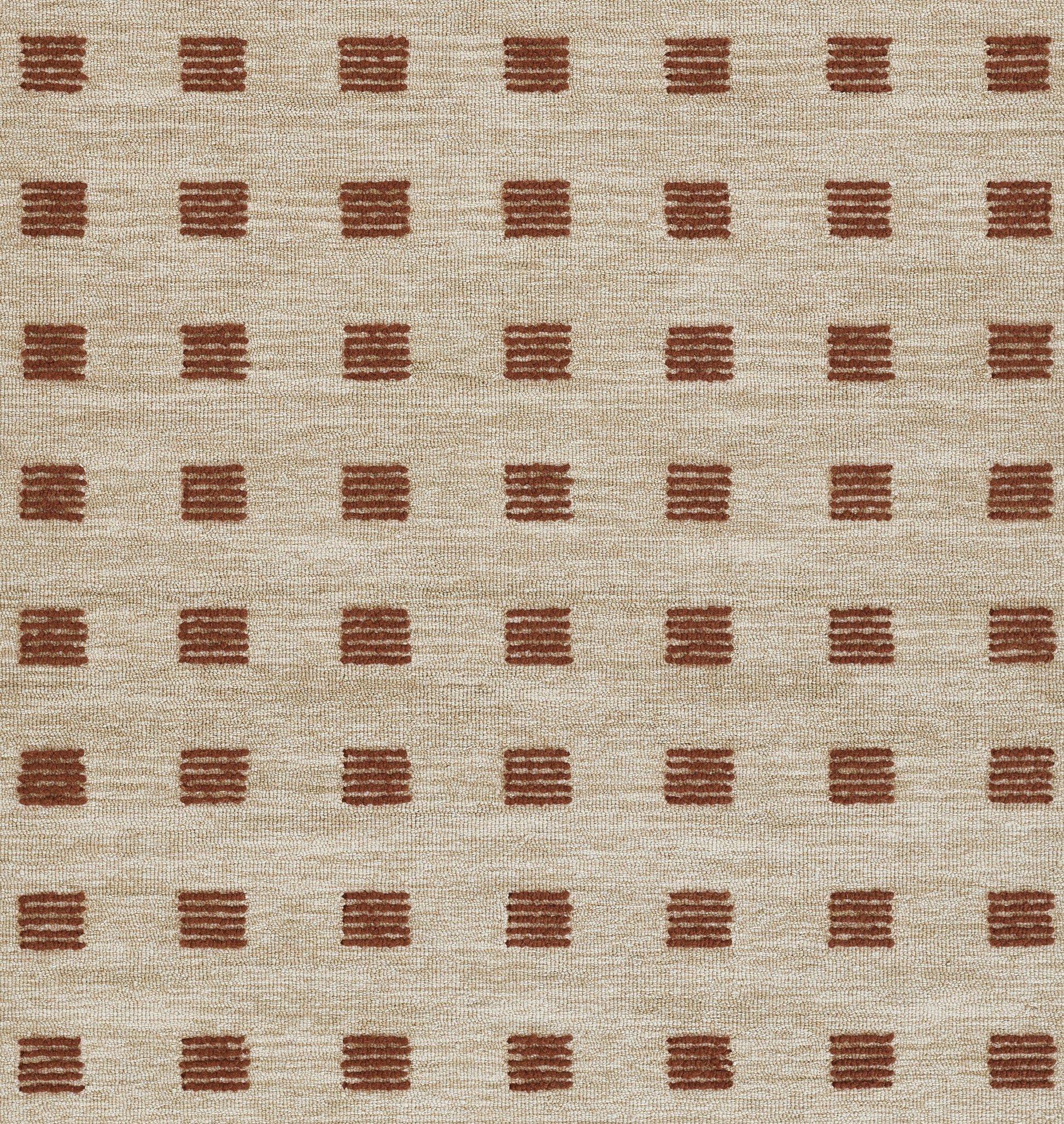 Beige woven rug with repeated rust-brown square brush-stroke blocks in a tidy grid.