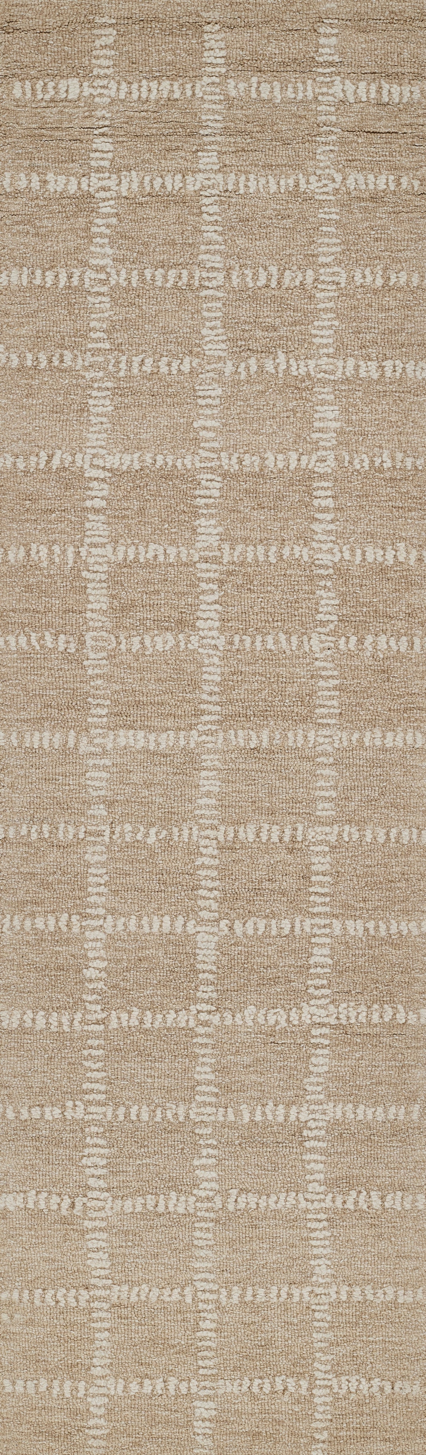 Beige woven area rug with white grid pattern forming squares; textured, jute-like surface.