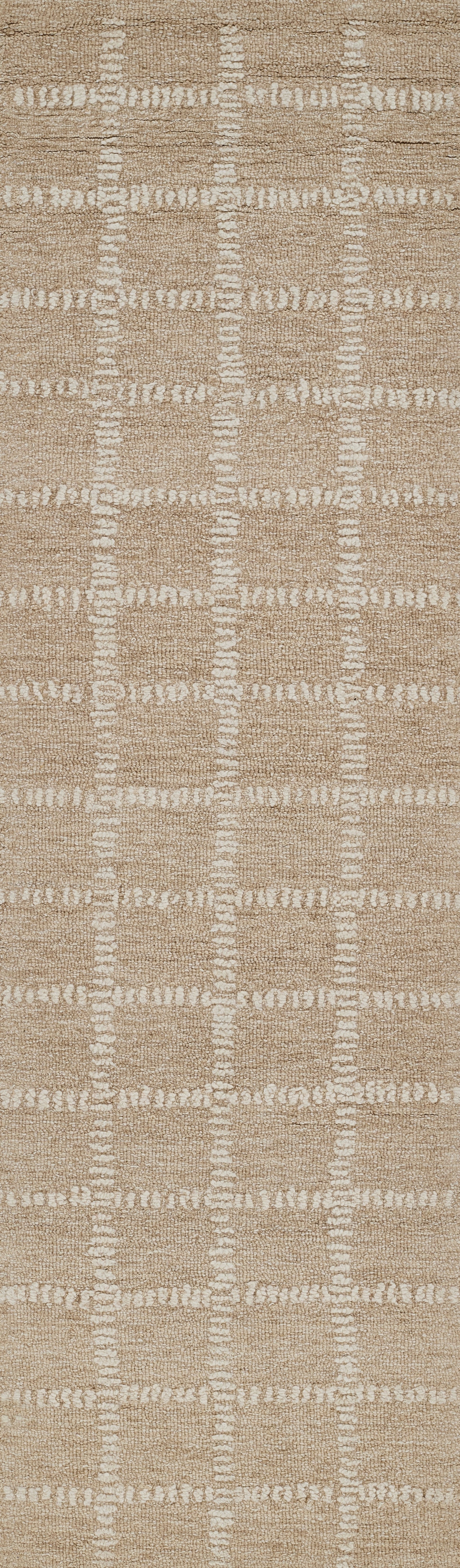 Beige textured rug with white grid-square pattern; woven, modern geometric design.
