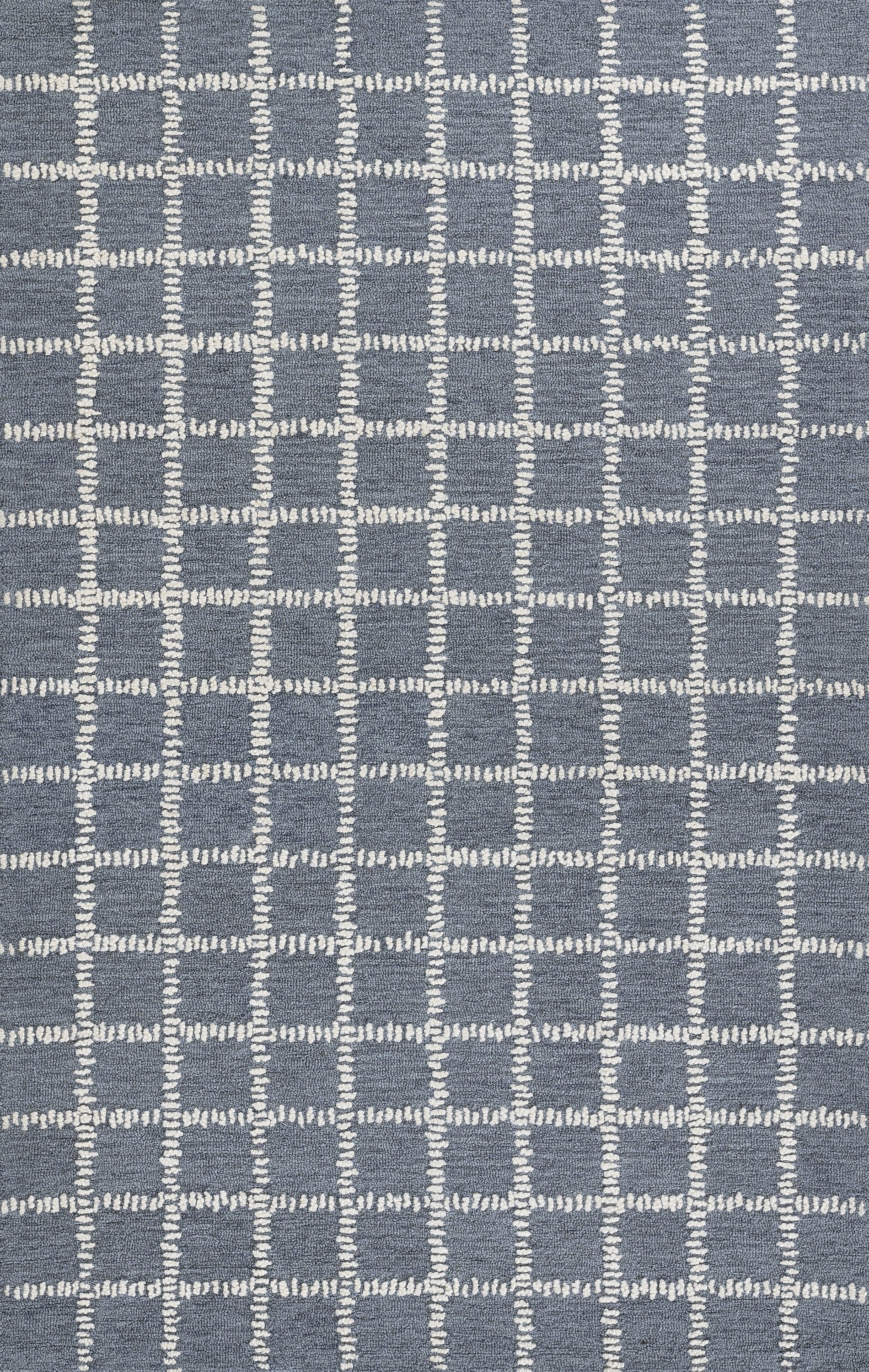 Blue-gray rug with a white dashed grid pattern forming squares; modern geometric style.