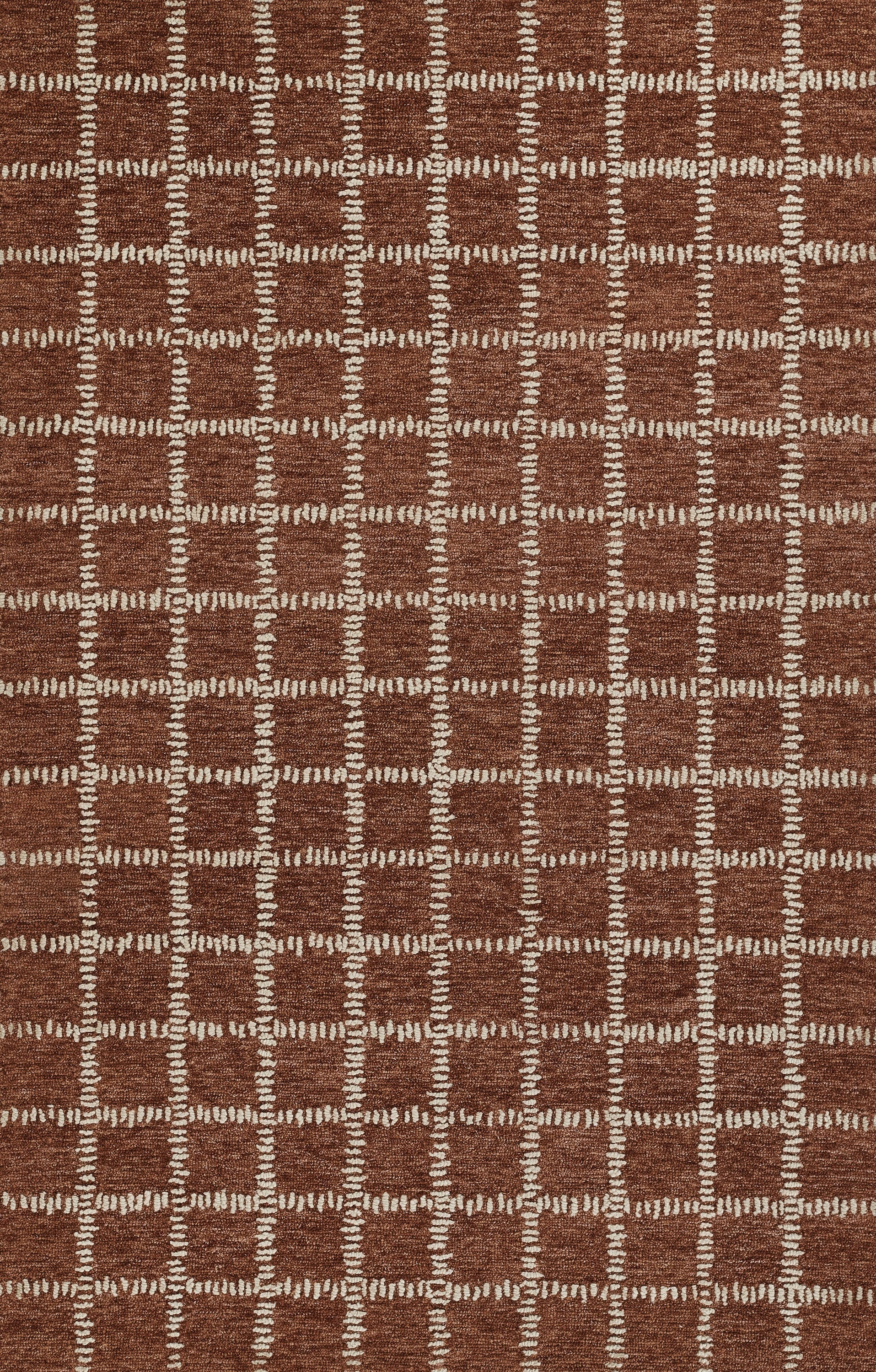 Brown rug with cream stitched grid pattern forming squares; soft tufted texture, modern geometric style.