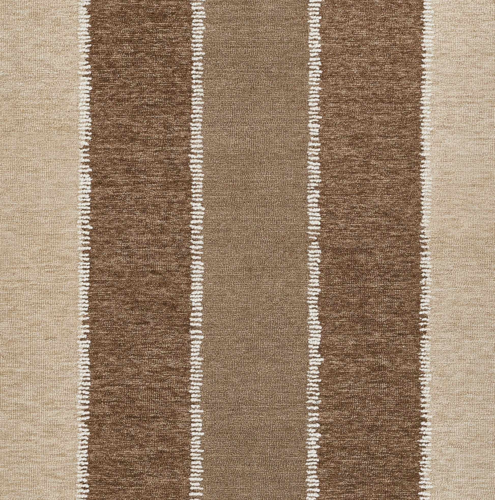 Beige and brown striped rug with vertical dark brown and tan panels, white dotted dividers, textured woven surface.