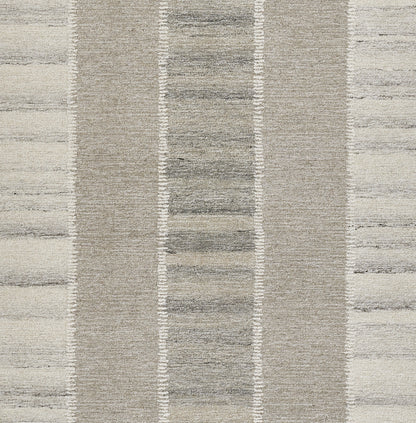 Neutral beige and gray striped area rug with textured woven pile and vertical band pattern.