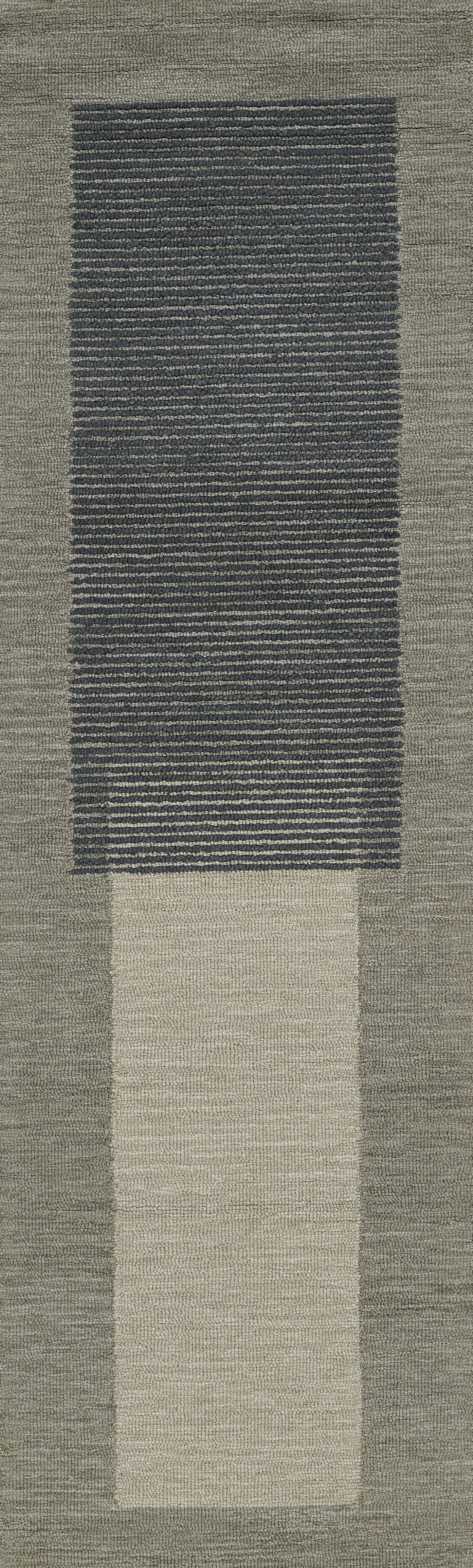 Rectangular woven area rug with a central dark blue striped panel framed by warm beige borders; modern geometric styling.