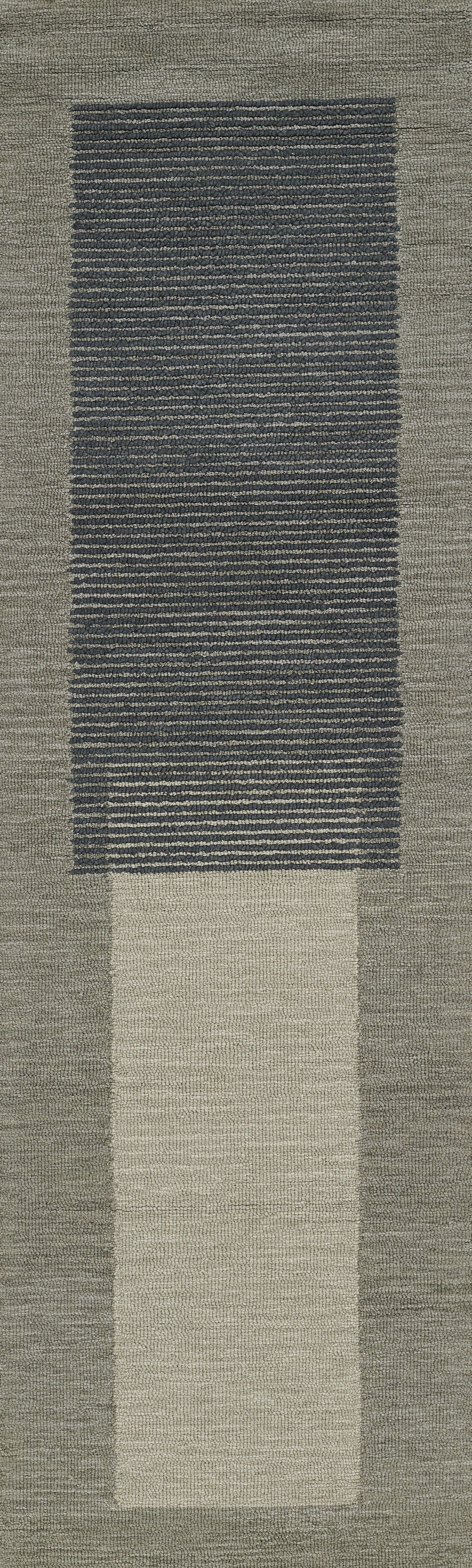 Rectangular woven area rug with a central dark blue striped panel framed by warm beige borders; modern geometric styling.