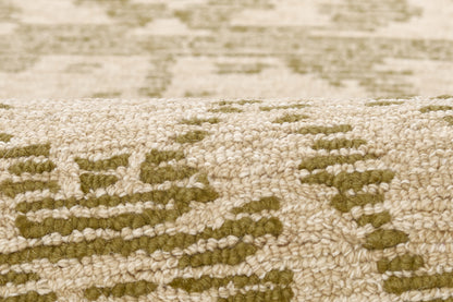 Beige textured rug with olive-green geometric pattern, woven pile, traditional oriental-inspired style.