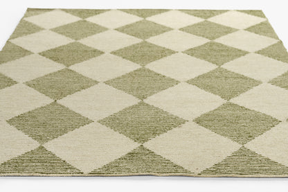 Rectangular rug in olive green and cream diamonds; flatwoven, textured surface for living room.