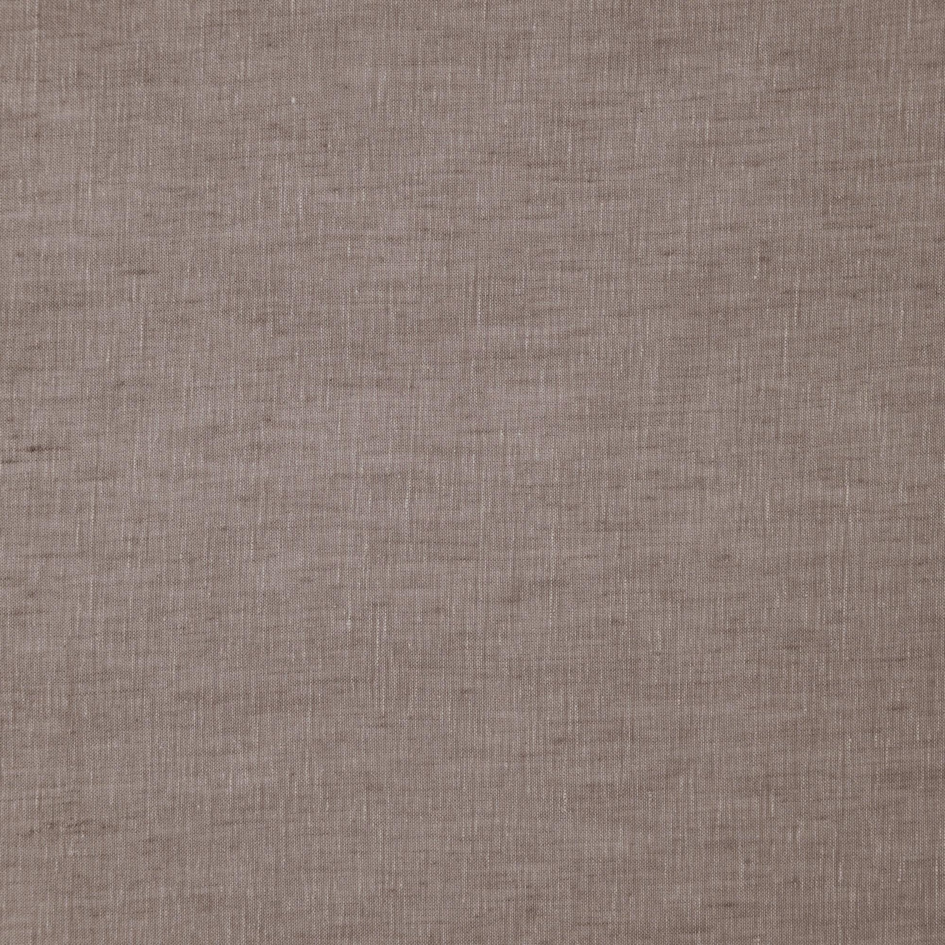 Brown linen fabric texture close-up; natural woven textile.