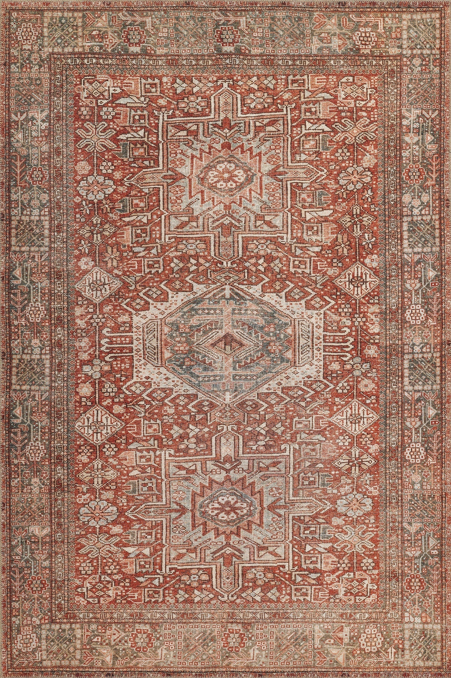 Red Persian-style rug with ivory motifs, blue-green accents and ornate geometric border.