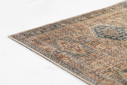 ARIANARI 4BLU rug: rectangular woven oriental rug with beige base, blue & brown geometric motifs, vintage distressed style.