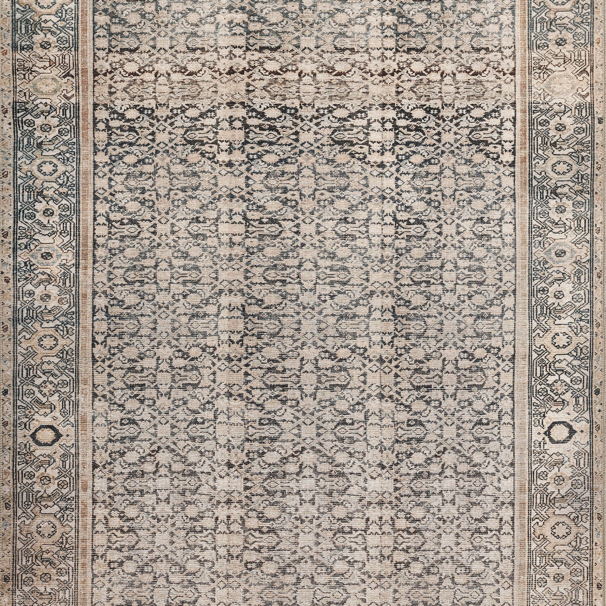 Beige distressed oriental rug with blue-grey floral motif and ornate border; Persian-style indoor area rug.