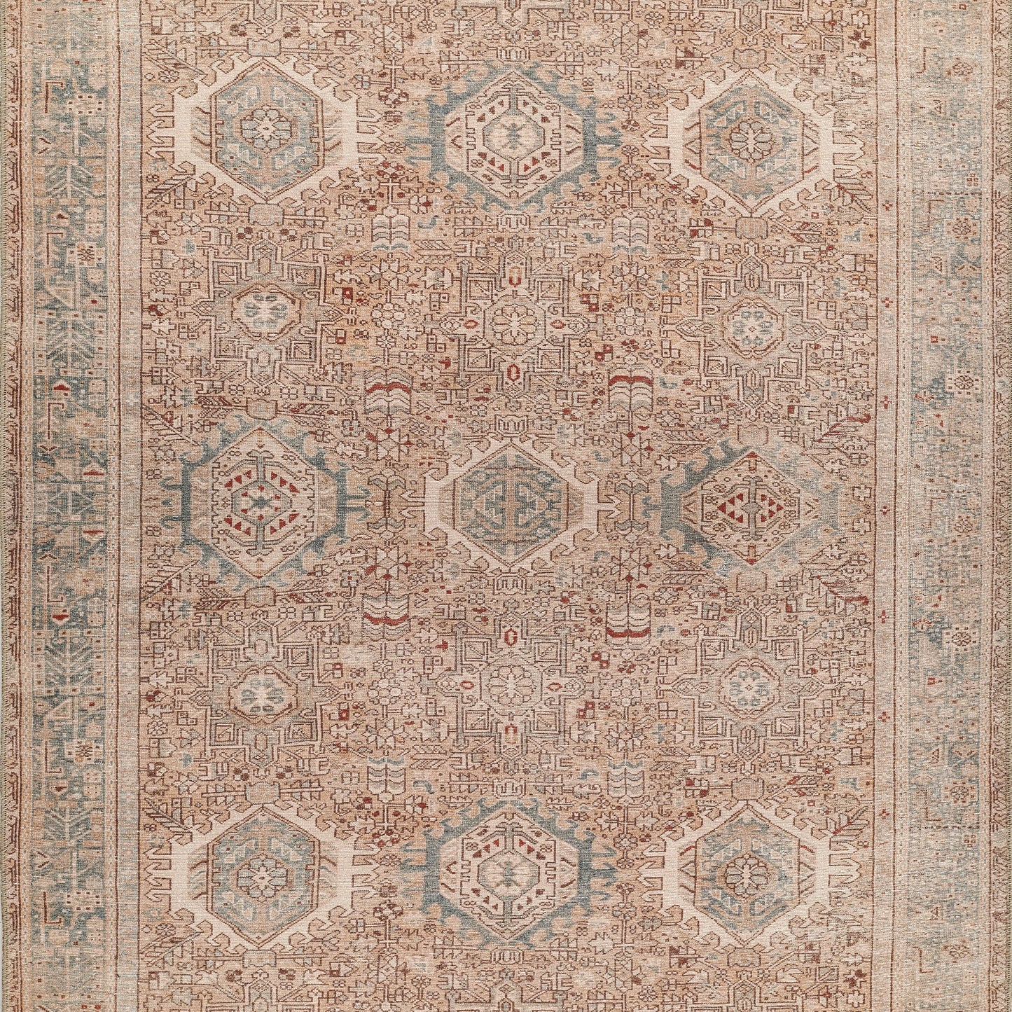 Distressed beige Persian-style rug with pale blue hexagonal medallions, intricate brown geometric motifs and blue border.