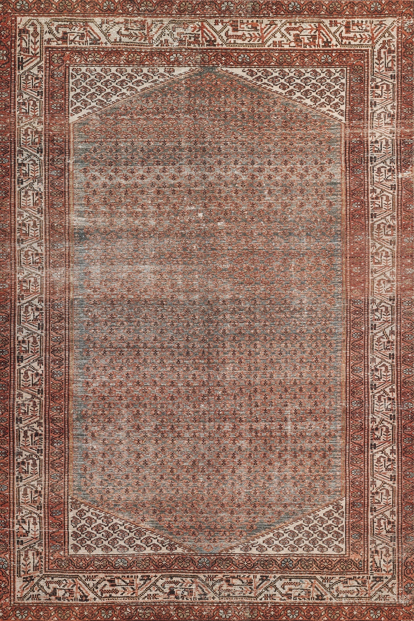 Distressed oriental rug with red border, ivory accents, blue-gray central field and geometric motifs; rectangular