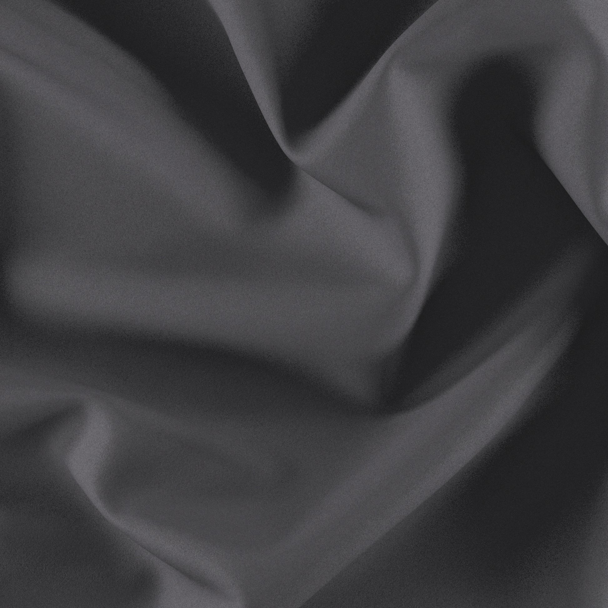 Dark gray velvet fabric with smooth drapes and soft folds.