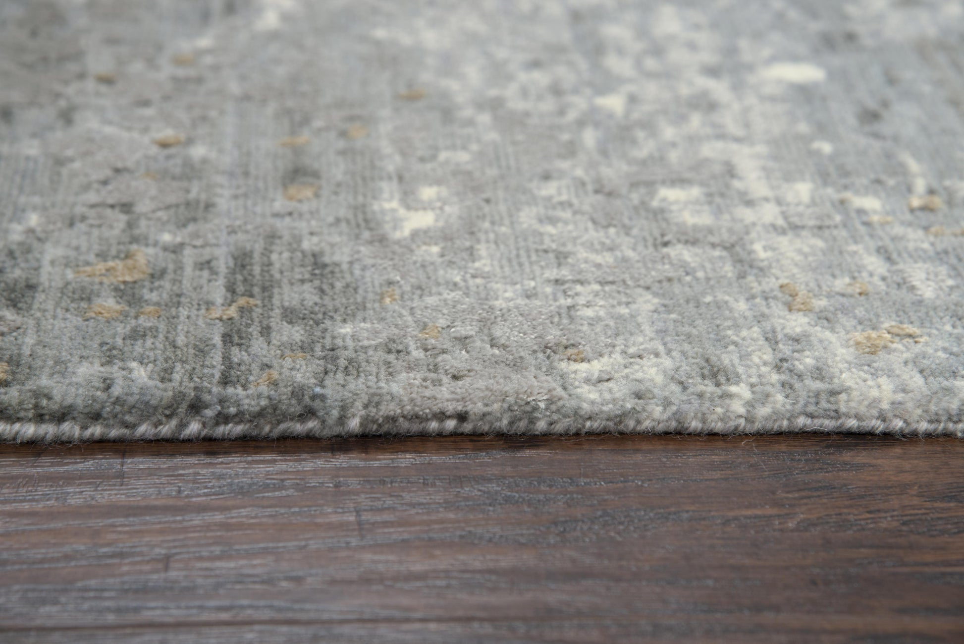 8' x 10' contemporary rug with a geometric pattern.