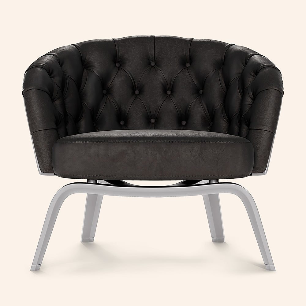 Espresso textured fabric tufted barrel chair with buttoned back and light gray metal legs.