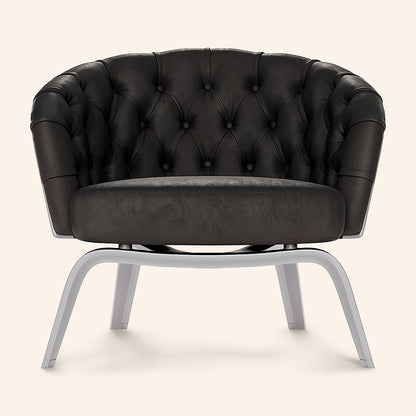 Espresso textured fabric tufted barrel chair with buttoned back and light gray metal legs.