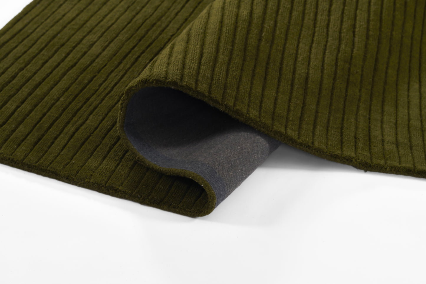 Olive green ribbed corduroy-like rug with gray underside; rectangular 5' x 8', cozy.