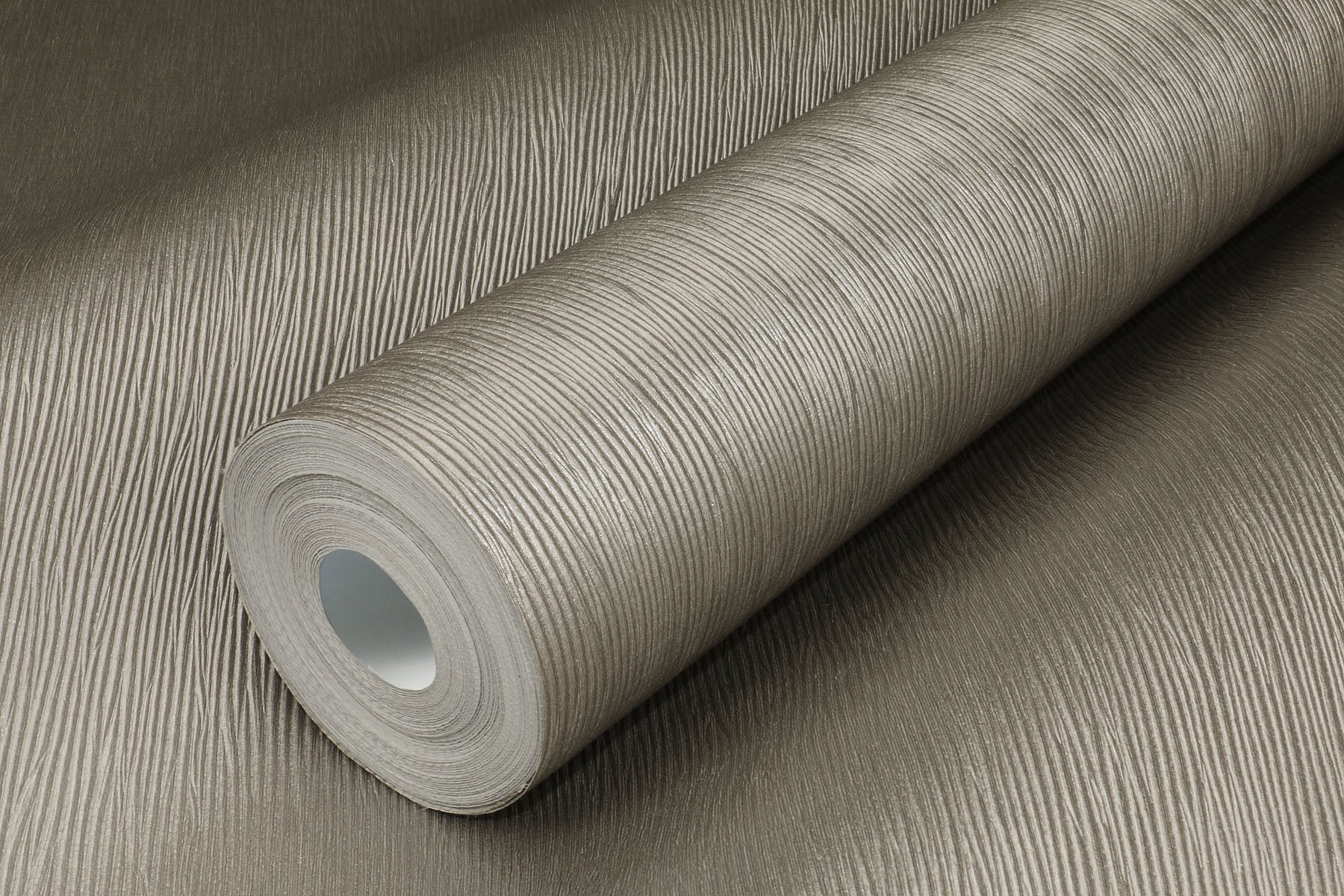 Gray vinyl wallpaper textured with palm fiber pattern and gloss finish, modern wallcovering for living room bedroom and office accent walls, neutral gray textured wallpaper for contemporary and minimalist interiors, durable USA made vinyl wallpaper for luxury home decor and interior design projects.
Palm fiber vinyl wallcovering with gloss finish.