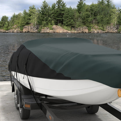 Green solid fabric material shown outdoors by a lake with a forested rocky shoreline.