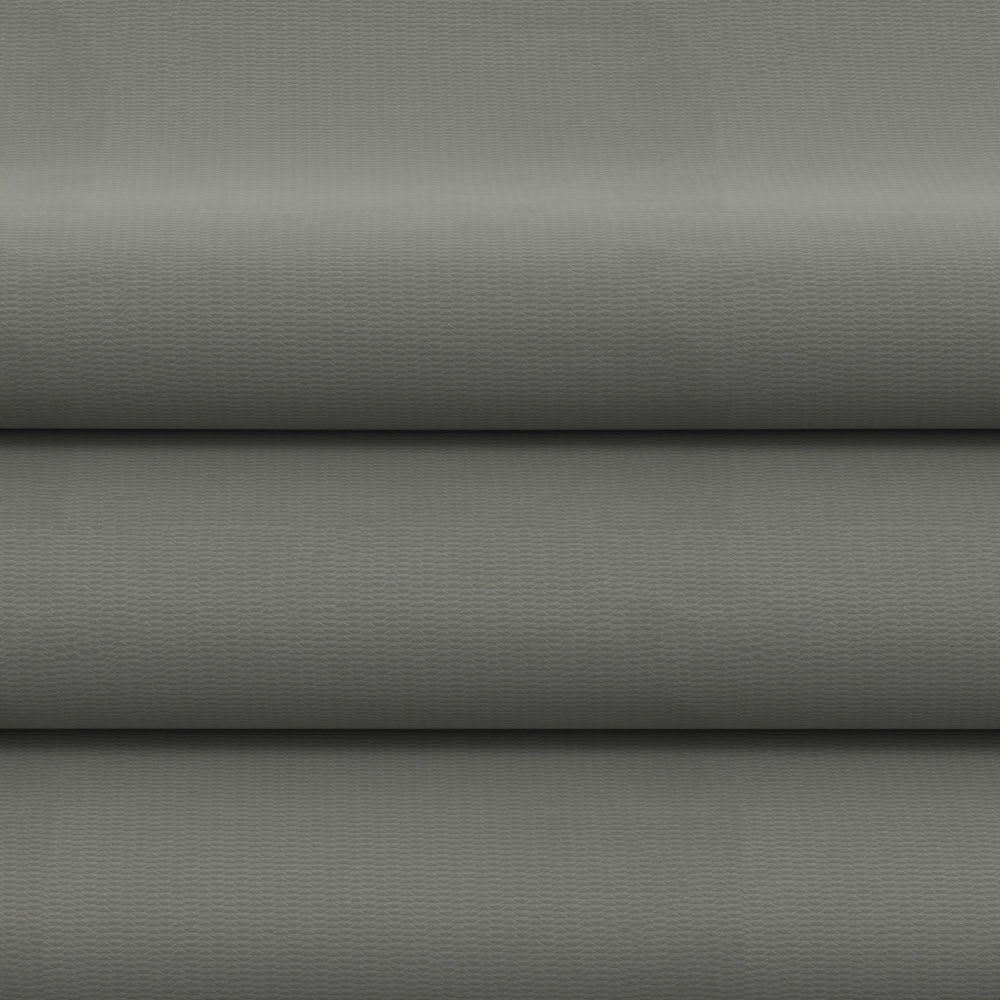 Gray solid fabric folded in horizontal layers, upholstery or drapery fabric.