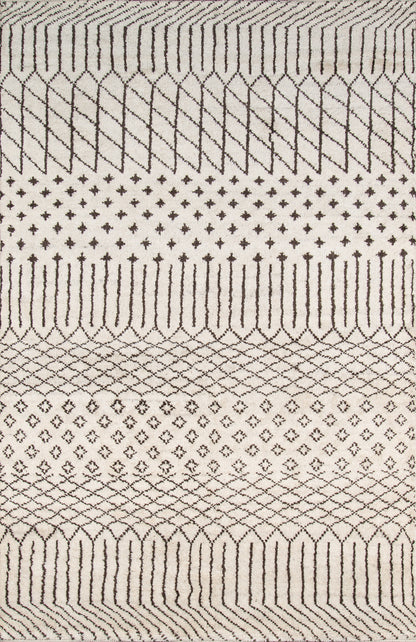 Beige woven rug with dark brown geometric motifs—diamonds, lattice, tiny cross dots and looping arched borders.
