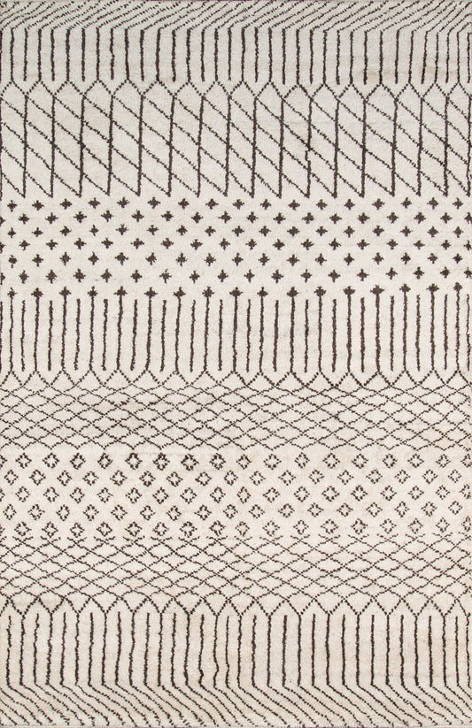 Beige woven rug with dark brown geometric motifs—diamonds, lattice, tiny cross dots and looping arched borders.