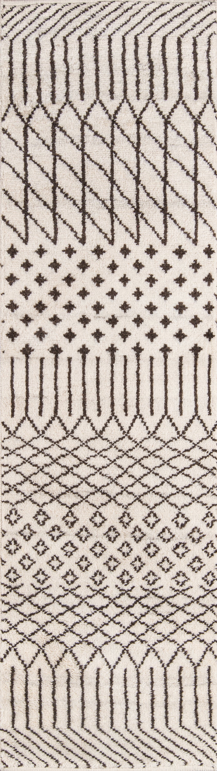 Neutral beige woven blanket with dark brown geometric tribal motifs; rectangular throw.