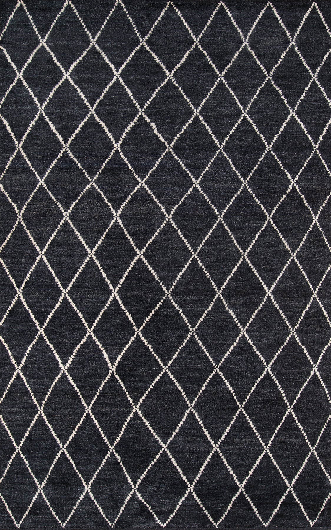 Charcoal rug with white diamond lattice pattern; modern geometric area rug.