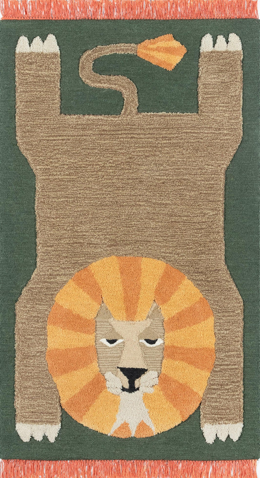 Brown cat-shaped rug on green field with an orange lion mane around a beige face, white paws, and orange fringe.