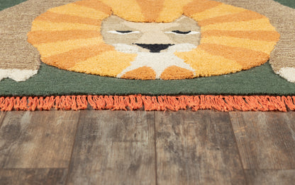 Lion-face rug with orange mane, yellow face on green field and orange fringe along a wooden floor