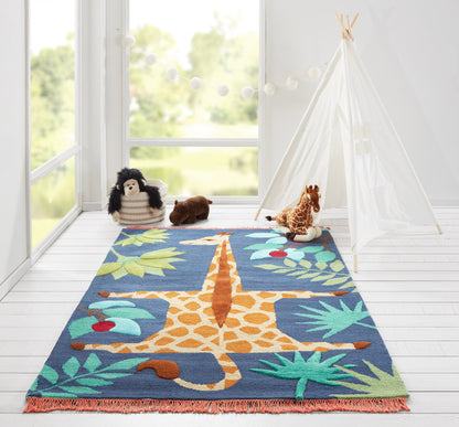 Bright sunlit kids' playroom with a blue tropical rug featuring a central orange giraffe, a white teepee, and plush animals.