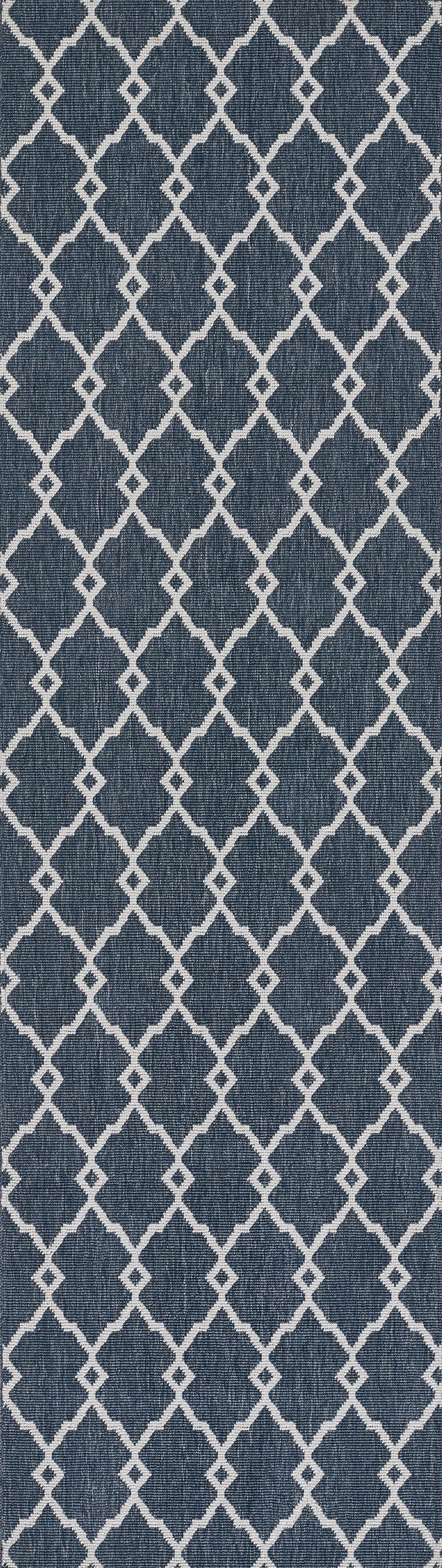 Navy blue rug with a white trellis diamond lattice pattern; 8' x 11'.