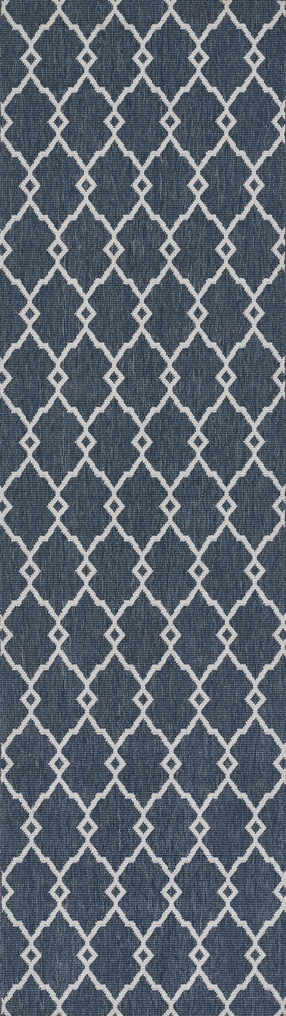 Navy blue rug with a white trellis diamond lattice pattern; 8' x 11'.