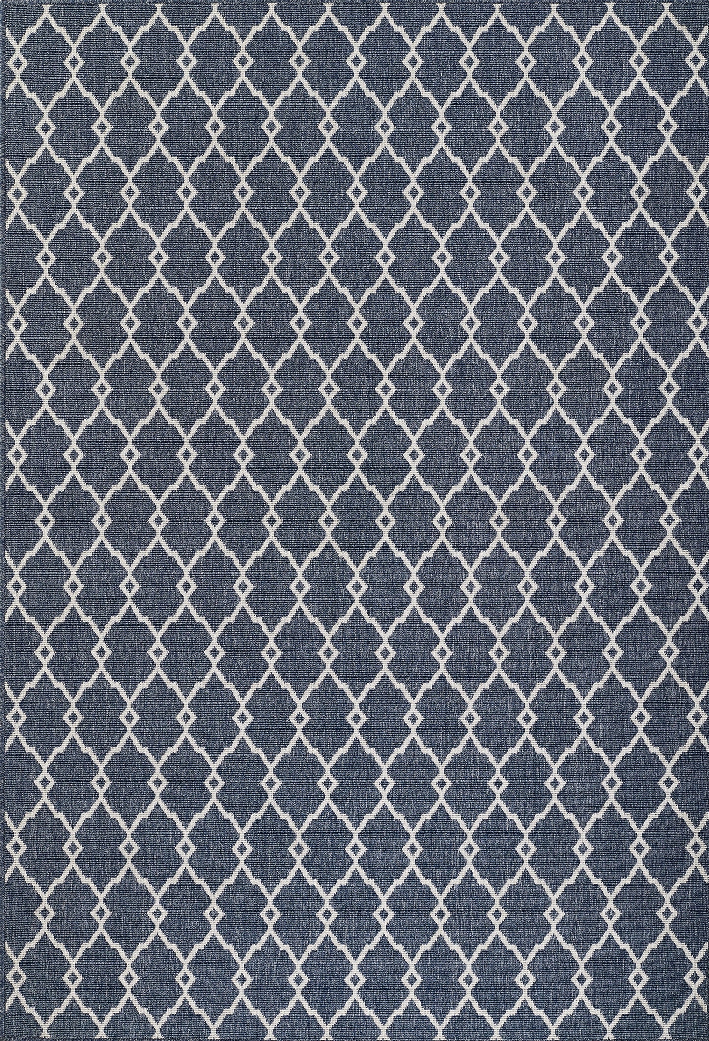 Indigo woven rug with a white lattice diamond trellis pattern for a modern casual look.