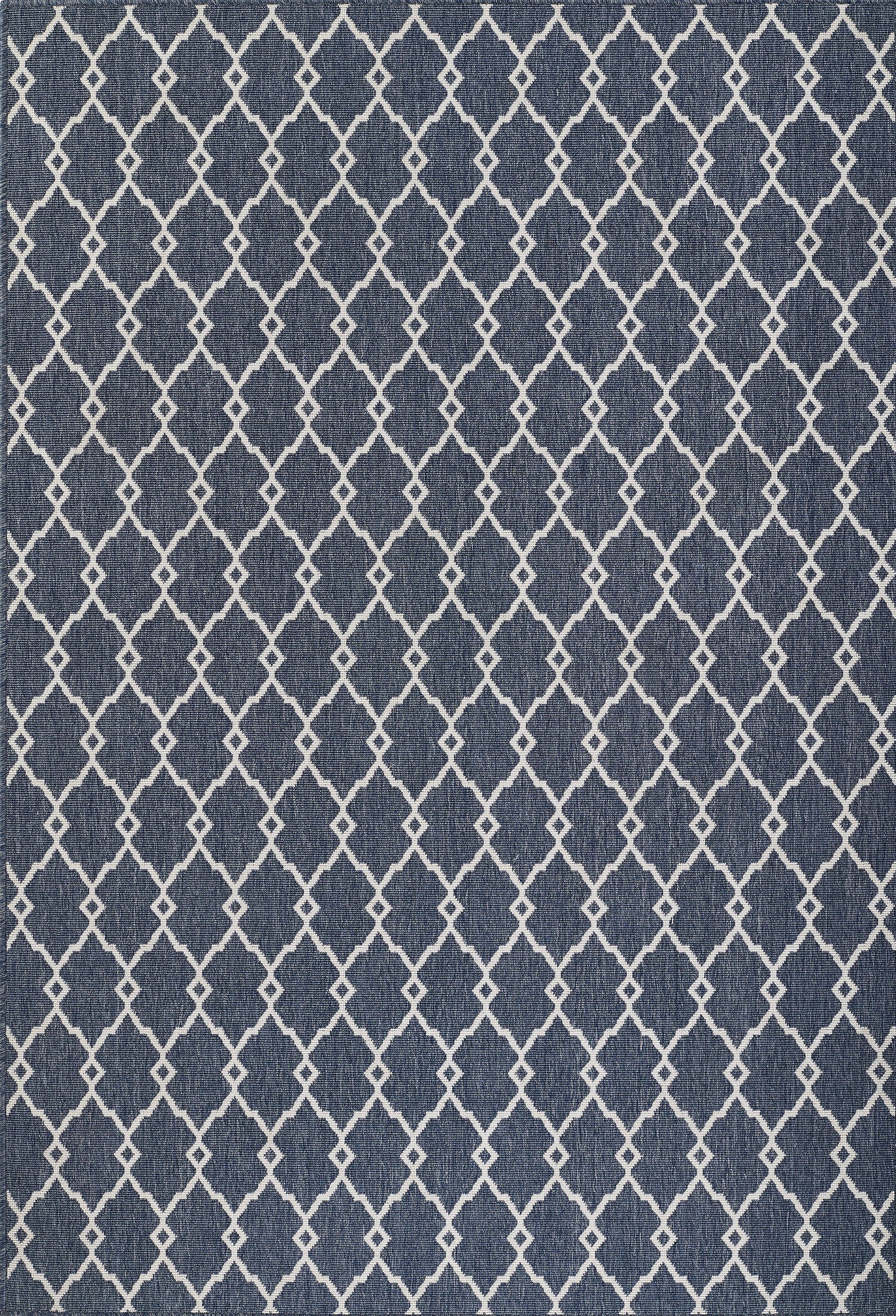 Indigo woven rug with a white lattice diamond trellis pattern for a modern casual look.