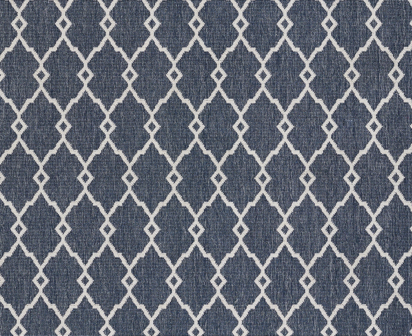 Navy blue rug with a white diamond lattice pattern; woven textile suitable for floors.