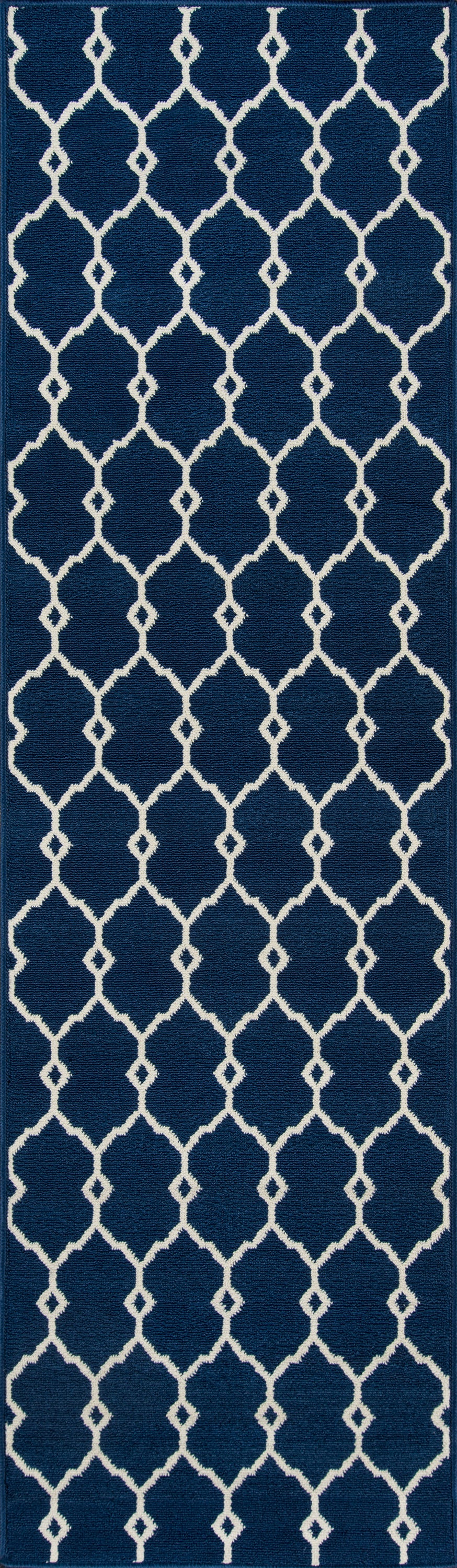 Navy blue rug, 4' x 6', with a white Moroccan trellis lattice pattern; a repeating geometric design.