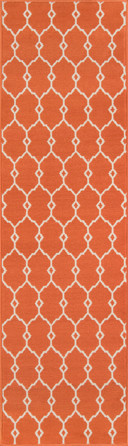 Orange rug with a white lattice trellis featuring repeating quatrefoil shapes.