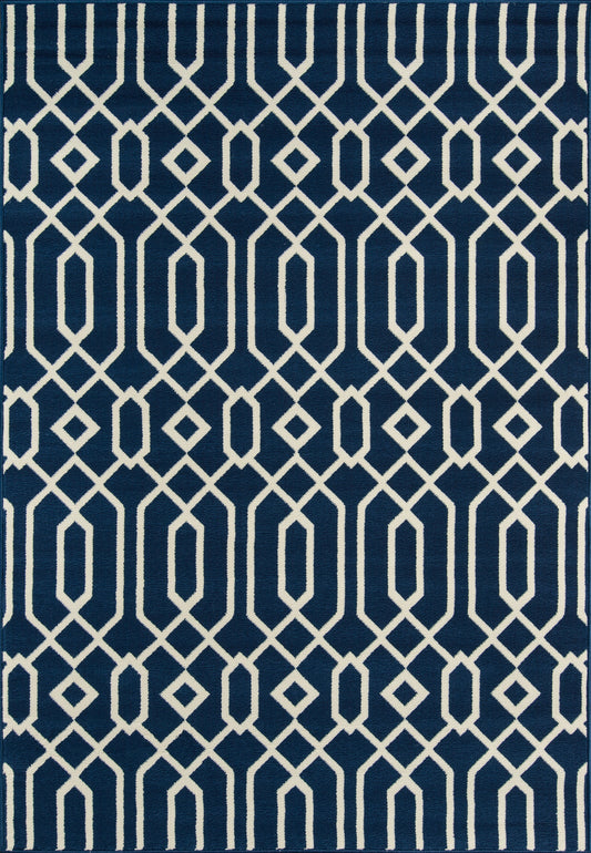 Navy blue rug with white geometric lattice pattern of interlocking diamonds; modern contemporary style.